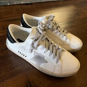 White sneakers with star